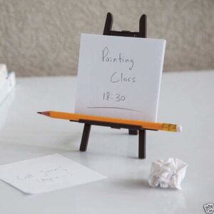 desktop easel on desk with pencil