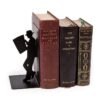 Leaning Man Bookend with old books