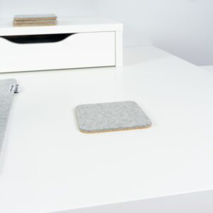 Wool and cork coaster on desk - BeaverPeak