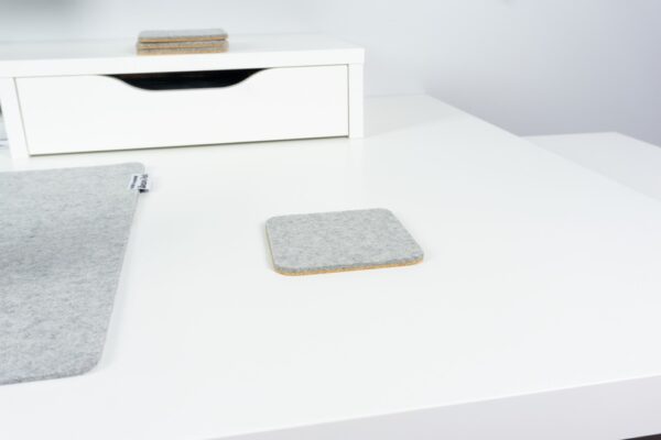 Wool and cork coaster on desk - BeaverPeak