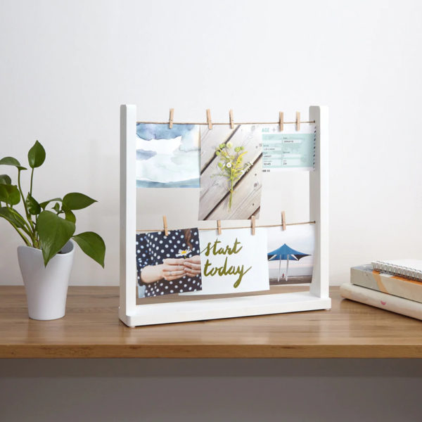 Desk picture frame - White frame on desk with 6 photos