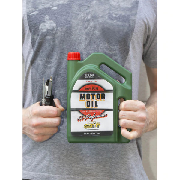 Oil jug toolkit, in hands for size comparison