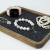 Walnut Wood Jewelry Tray - Black inner lining with pearl and diamond necklaces and smart watch, Wide angle