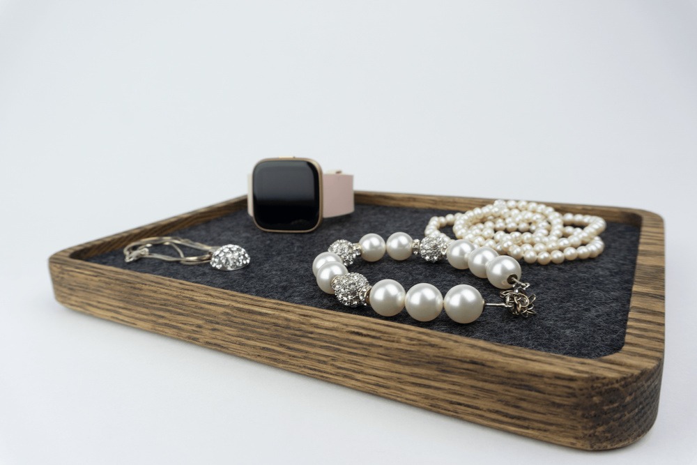 Walnut Wood Jewelry Tray - Black inner lining with pearl and diamond necklaces and smart watch
