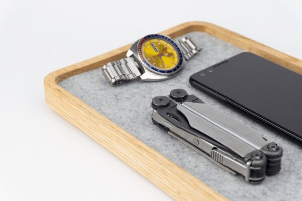 Wood Jewelry Tray - With Watch, Multitool, Phone - Natural, Light grey lining, close up
