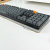 Wool Keyboard Mat Grey with Keychron K10 keyboard, shallow angle