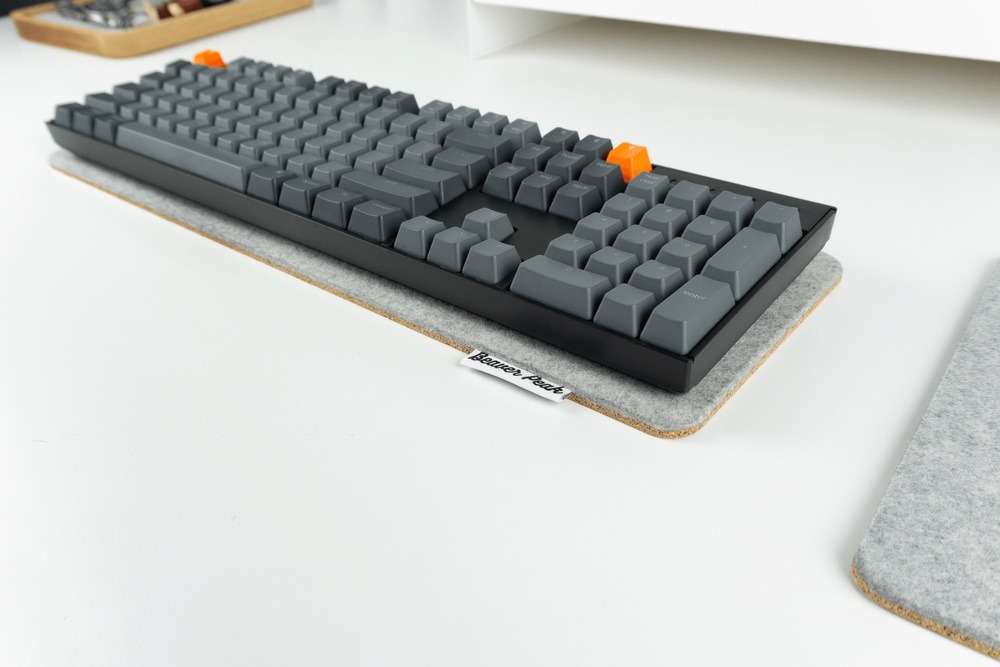 Wool Keyboard Mat Grey with Keychron K10 keyboard, shallow angle
